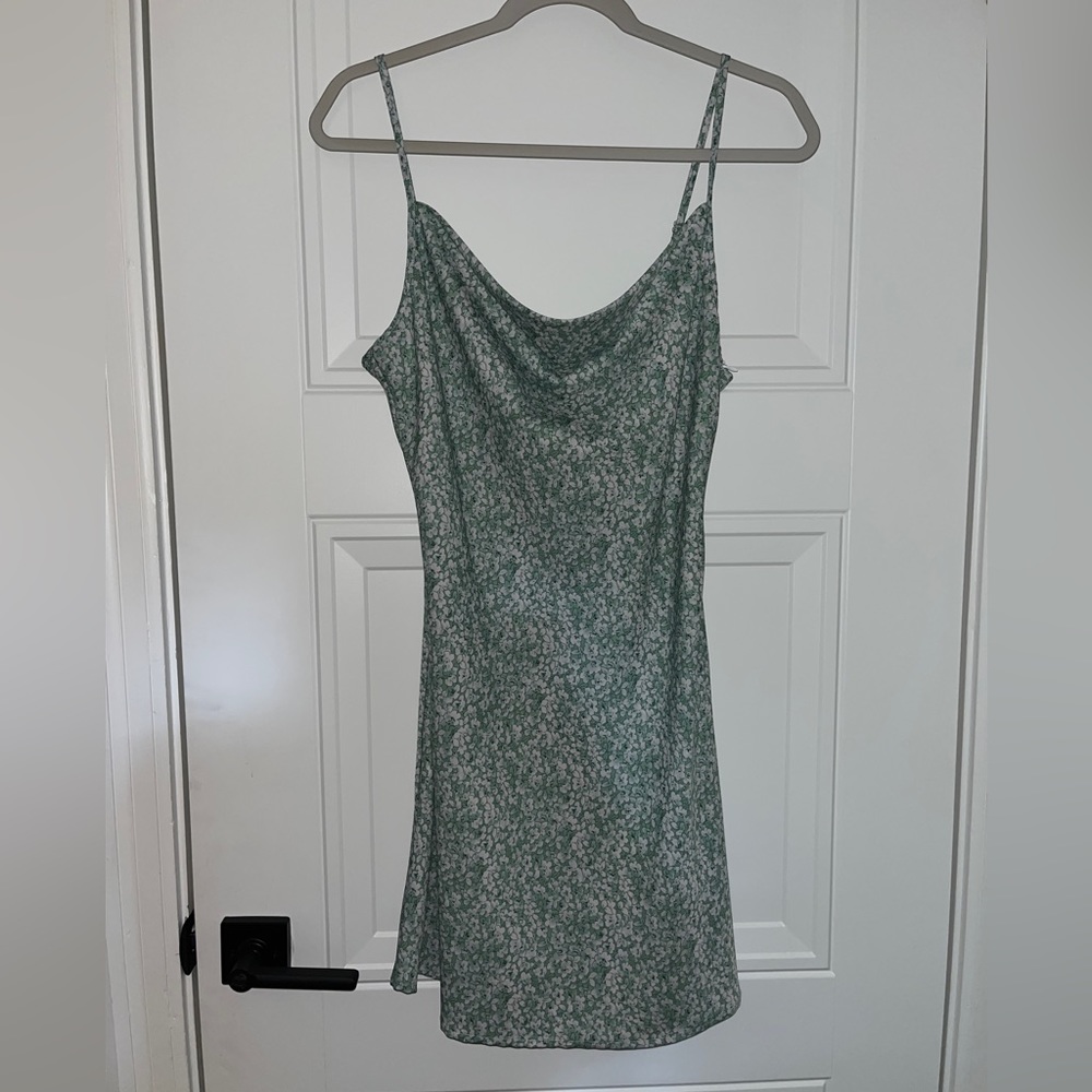 Mini dress. Nice fit around the waist but still a little flowy.